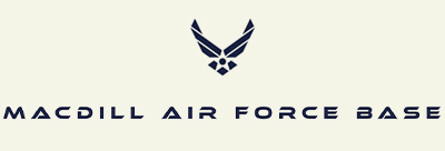 The image features the emblem of the US Air Force above the text "MacDill Air Force Base." The emblem consists of a stylized pair of wings and a star. The entire graphic is in a dark blue color against a light background.