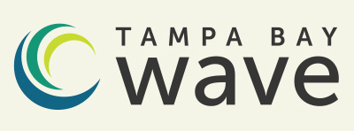 The image is a logo for Tampa Bay Wave. It includes a stylized wave graphic with three swooping curves in teal, green, and blue, accompanied by the text "TAMPA BAY wave" in uppercase, with "TAMPA BAY" in smaller font size above "wave.