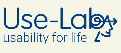 Use-Lab logo with "usability for life" in smaller text beneath. To the right, an abstract face and right arrow symbol is integrated into the logo design.